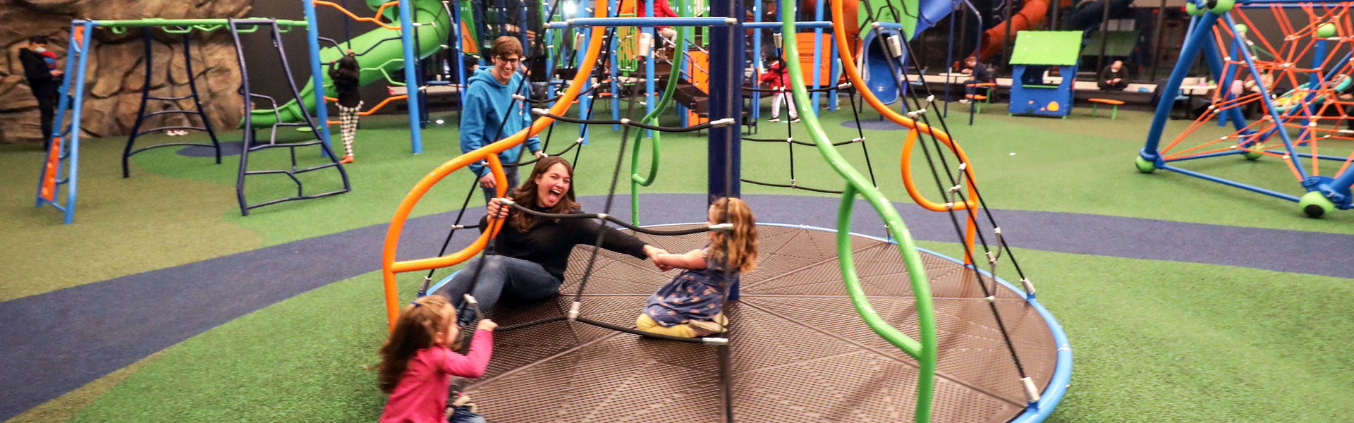 People playing in the K.U.B.E. Indoor Playground at the Plymouth Community Center